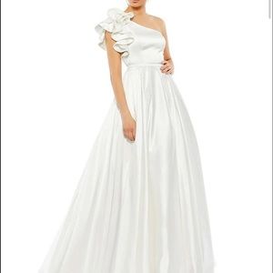 Mac Duggal gown never worn.